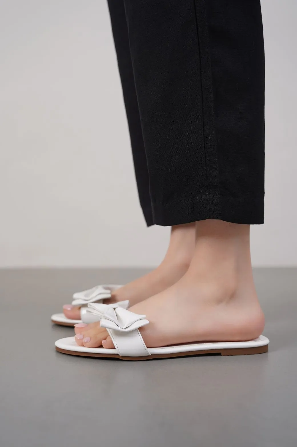 STATEMENT BOW SLIDES